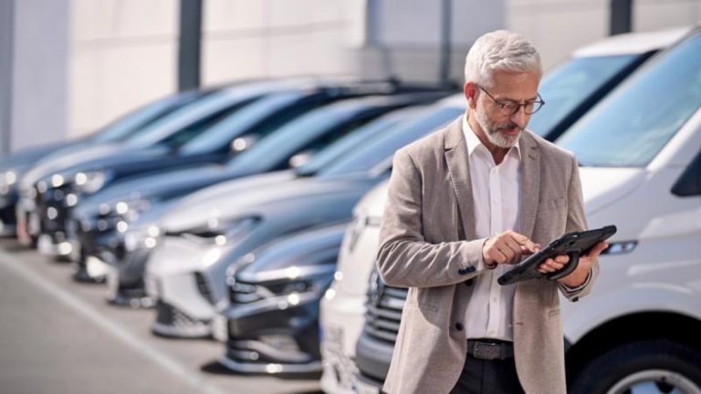 Manager reviewing rental fleet profitability
