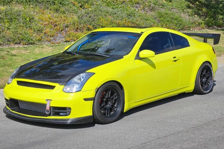 Modified Infiniti G35 coupe parked outdoors with sporty styling and performance-inspired details
