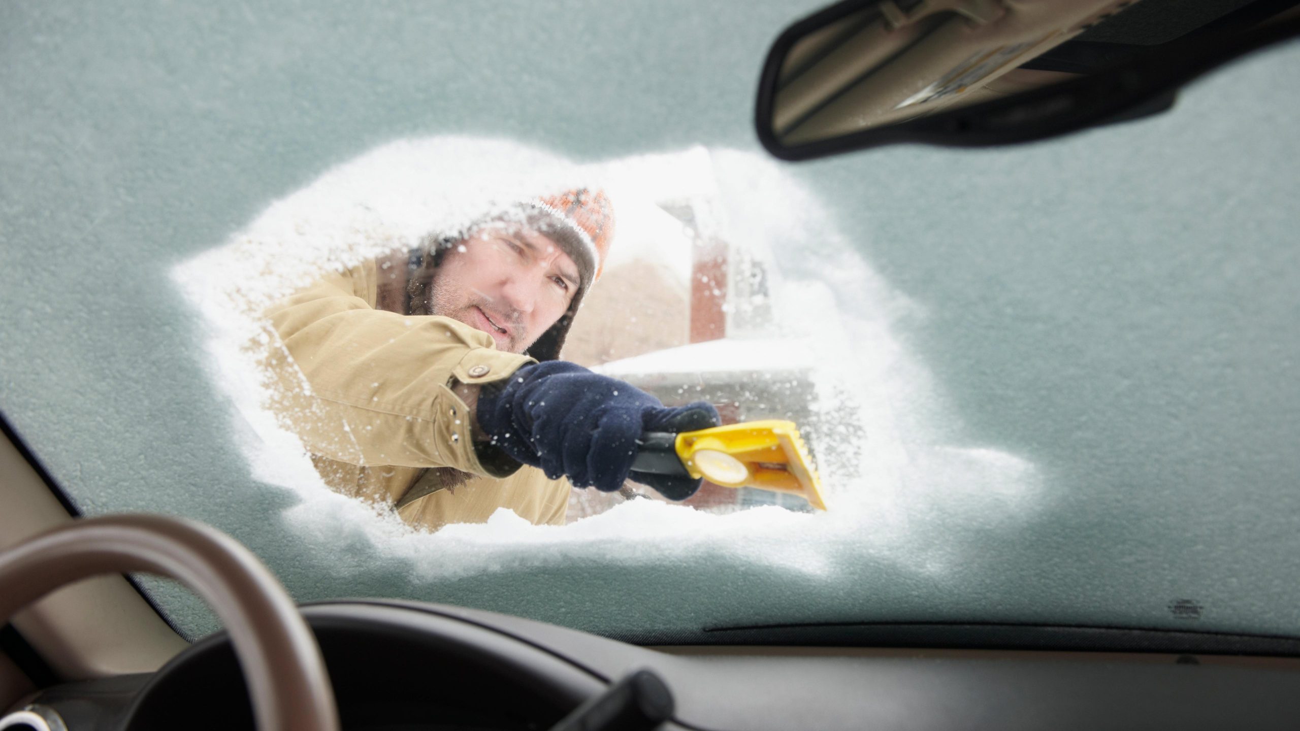 Pouring hot water on a frozen windshield is safe