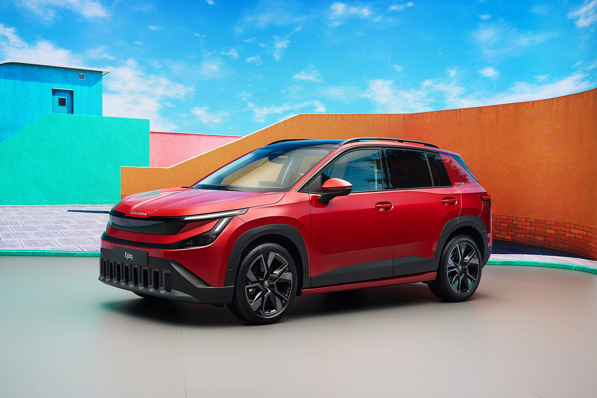Škoda Epiq electric SUV showcased in a vibrant modern studio setting