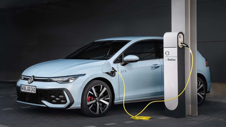 Volkswagen Golf GTE plugged into an EV charging station, highlighting its plug-in hybrid technology