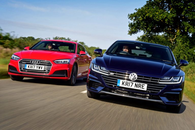 Audi A5 Sportback and a blue Volkswagen Arteon