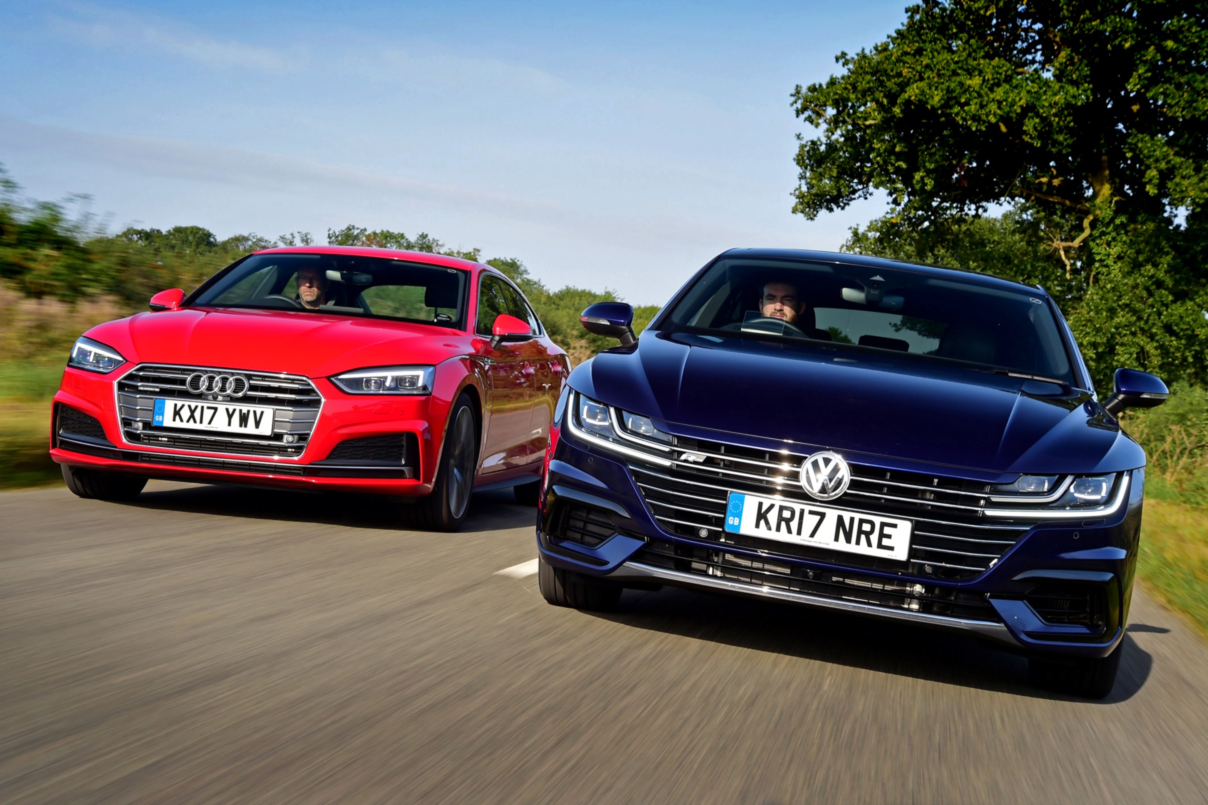 Audi A5 Sportback and a blue Volkswagen Arteon