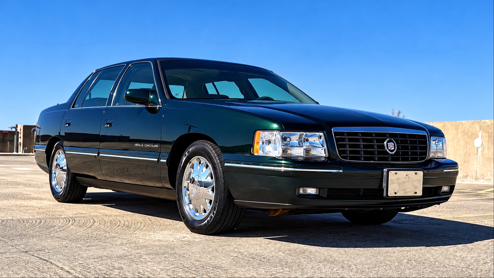 A Cadillac Deville is standing on a runway