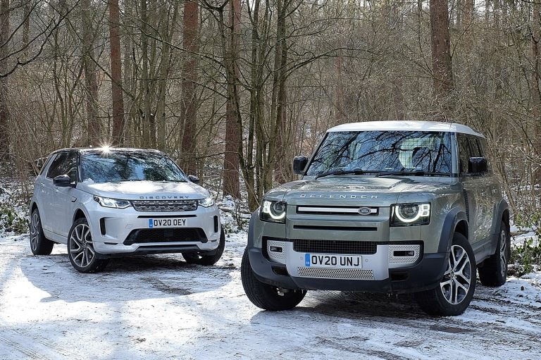 Land Rover Defender and a Land Rover Discovery Sport