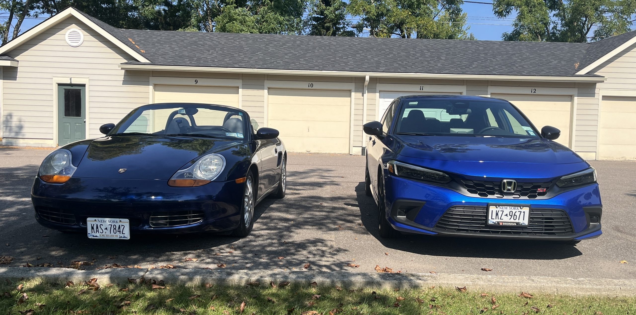 Porsche Boxster convertible and Honda Civic Si